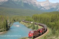 CP AC4400 number 9736 pulls a train of tank cars through Morant's Curve